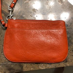 Pumpkin spice Coach wristlet